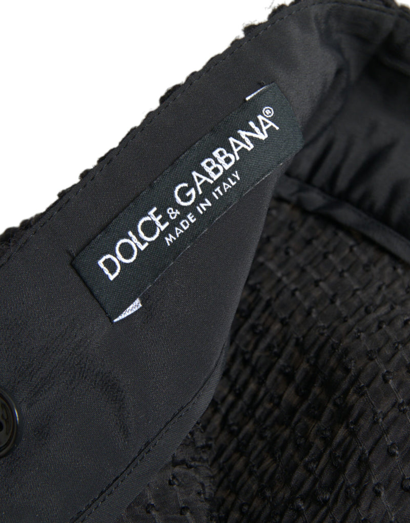 Saia Dolce & Gabbana preta de cintura alta, corte evasê e comprimento até o joelho