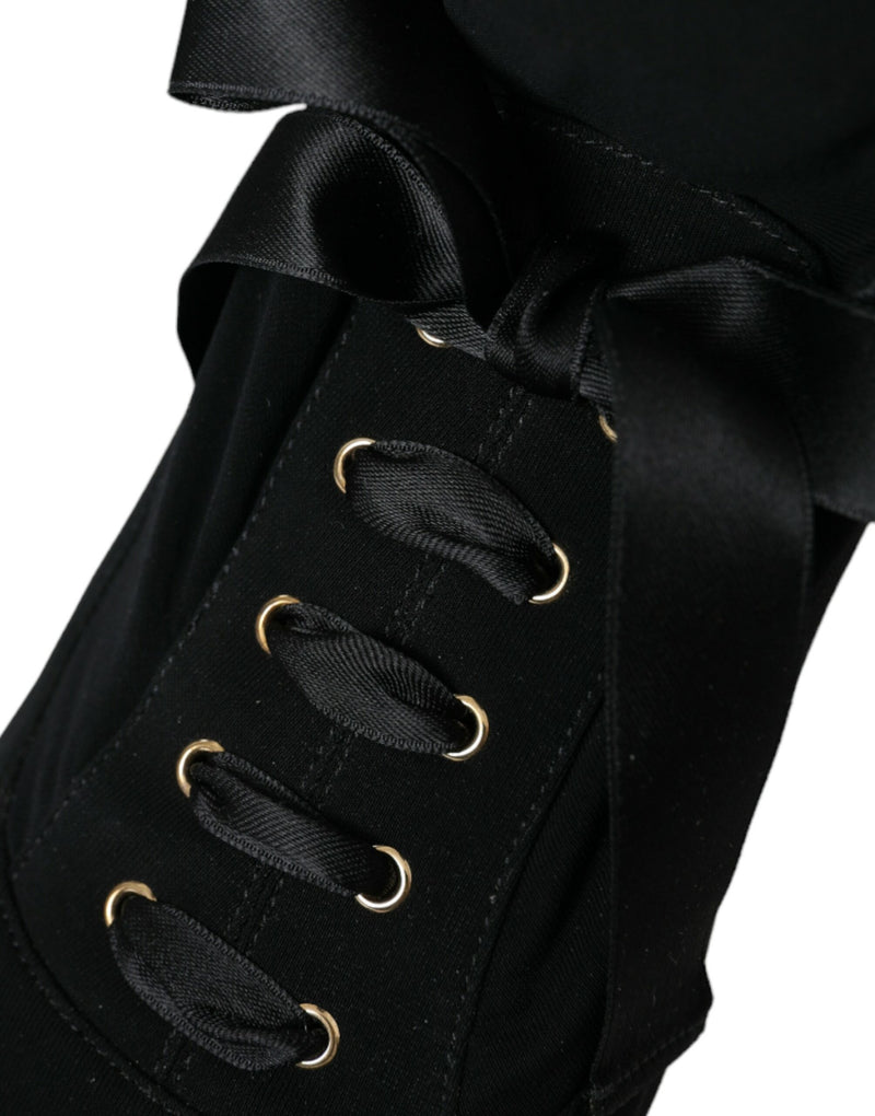 Botas negras de media caña con tacón de aguja de Dolce & Gabbana