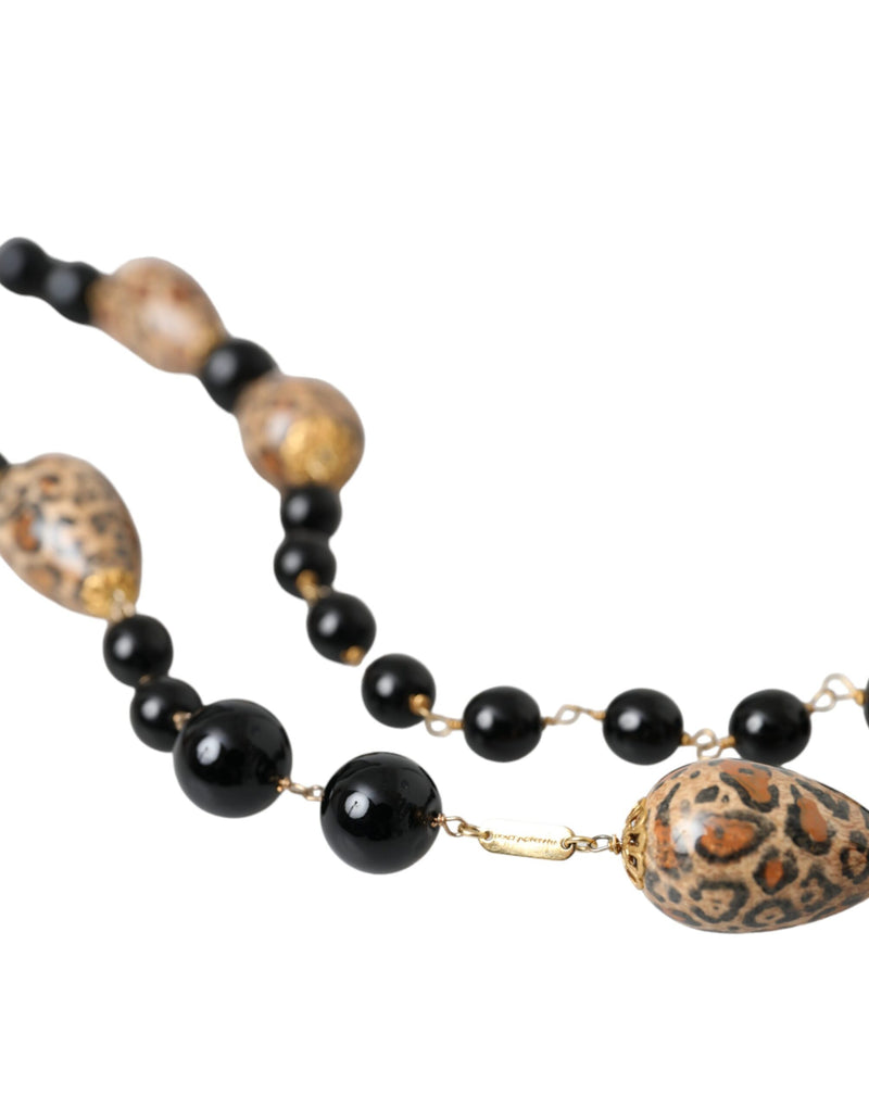 Long collier à perles imprimées noires Dolce & Gabbana en laiton doré