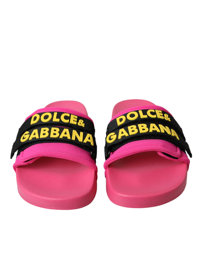 Sandalias planas negras y rosas con logo de ropa de playa de Dolce & Gabbana