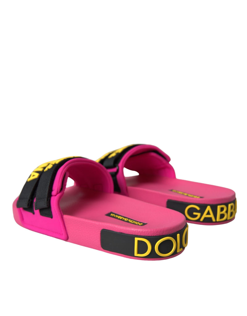 Sandalias planas negras y rosas con logo de ropa de playa de Dolce & Gabbana