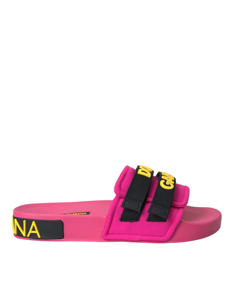 Sandalias planas negras y rosas con logo de ropa de playa de Dolce & Gabbana