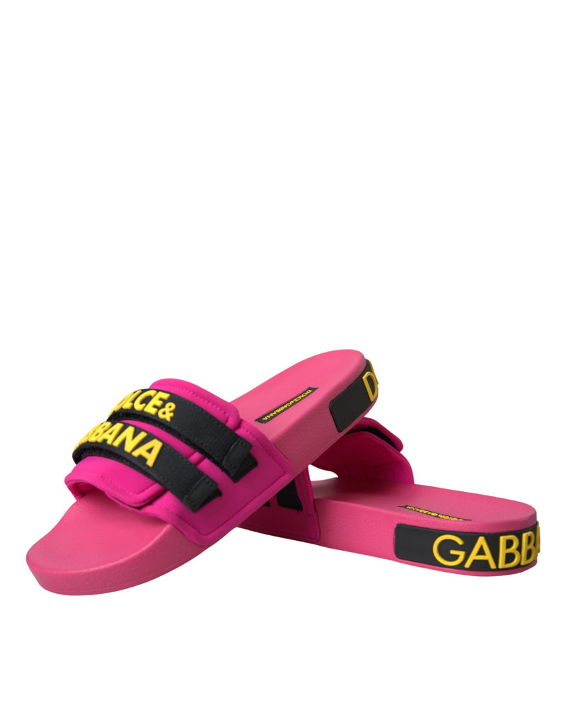 Sandalias planas negras y rosas con logo de ropa de playa de Dolce & Gabbana