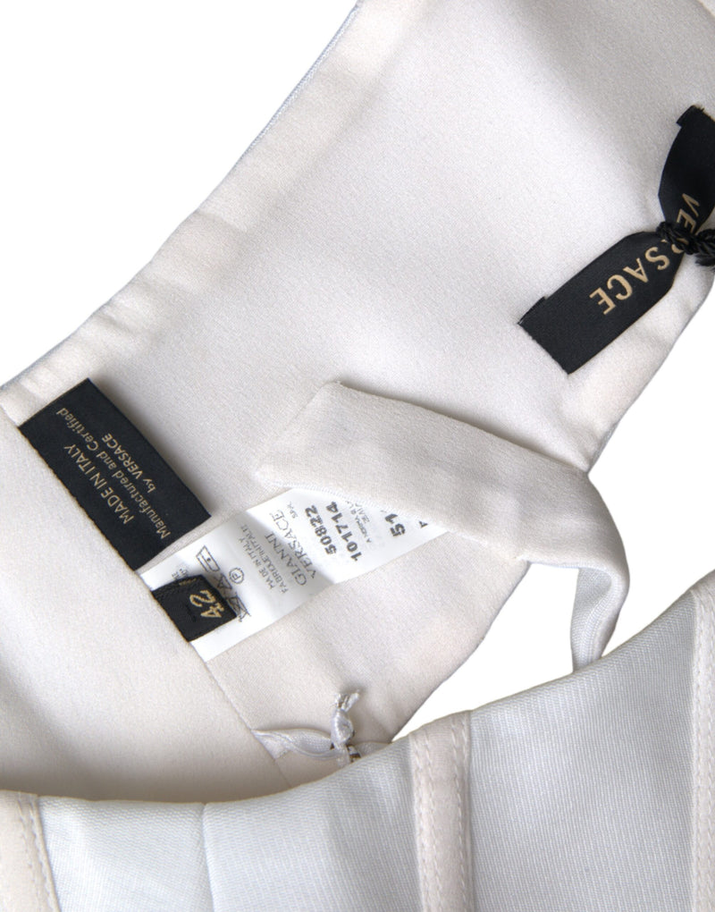 Versace Haut court bustier blanc sans manches en viscose