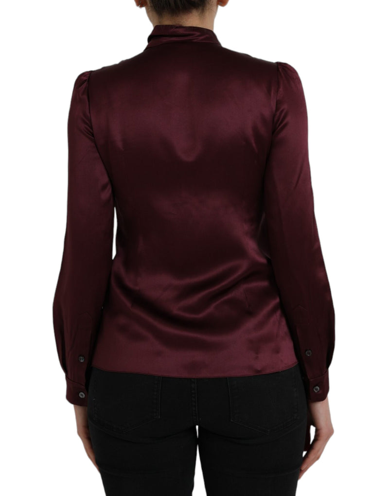 Blusa de manga larga color granate con cuello ascot de Dolce & Gabbana
