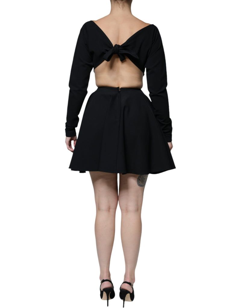 Minivestido negro de viscosa con aberturas, corte en A y mangas largas Dolce & Gabbana