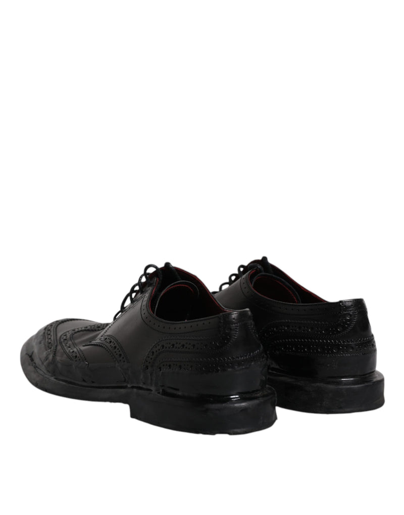 Sapatos sociais Derby pretos de couro com bico wingtip Dolce & Gabbana