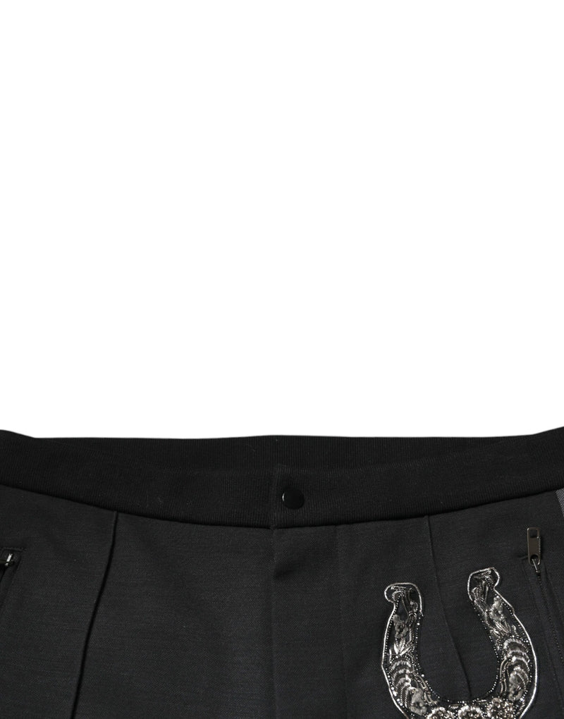 Pantalon slim en laine noire orné de fers à cheval Dolce & Gabbana