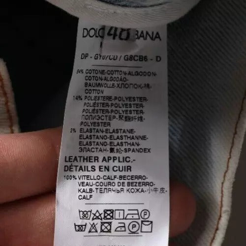 Calça jeans skinny destroyed de mistura de algodão azul-claro Dolce & Gabbana