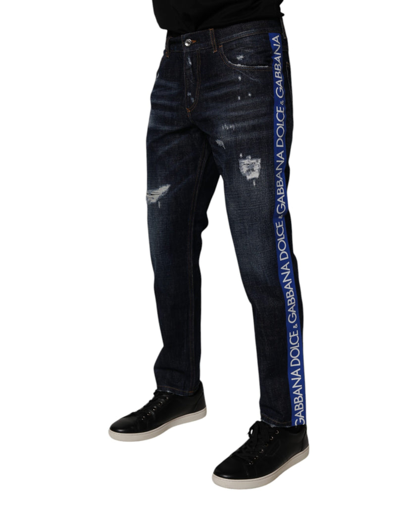 Vaqueros pitillo de mezclilla de algodón azul oscuro desgastados de Dolce & Gabbana