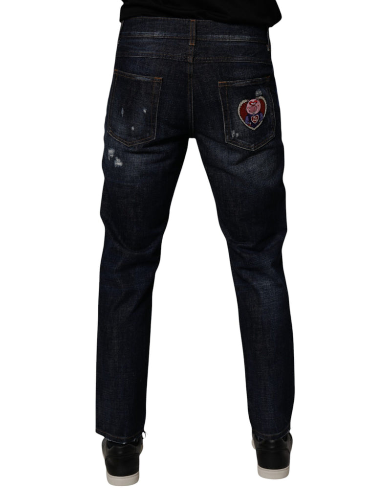 Vaqueros pitillo de mezclilla de algodón azul oscuro desgastados de Dolce & Gabbana