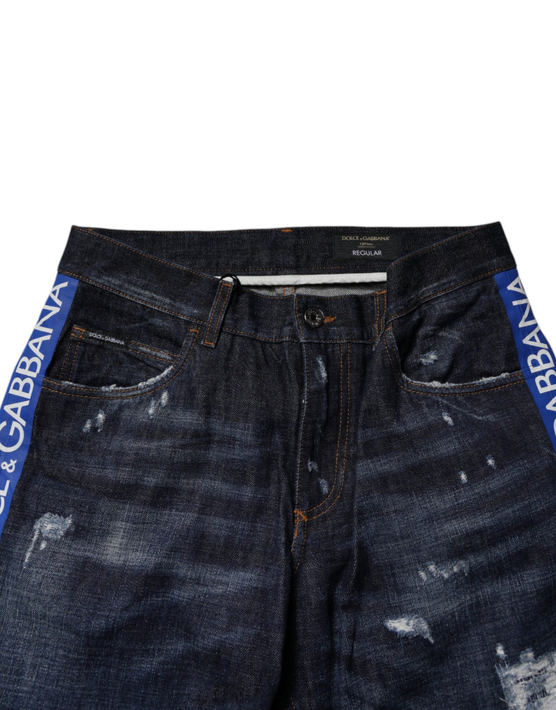 Vaqueros pitillo de mezclilla de algodón azul oscuro desgastados de Dolce & Gabbana