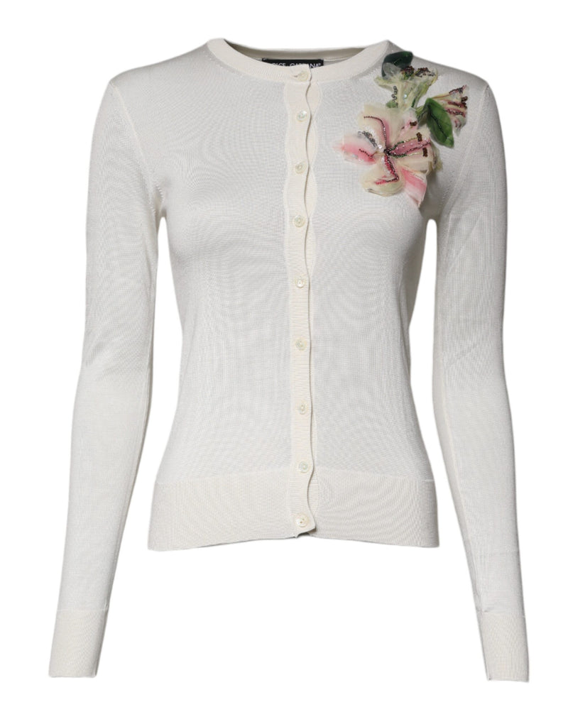 Cárdigan de seda color crema con estampado floral y detalles decorativos de Dolce & Gabbana