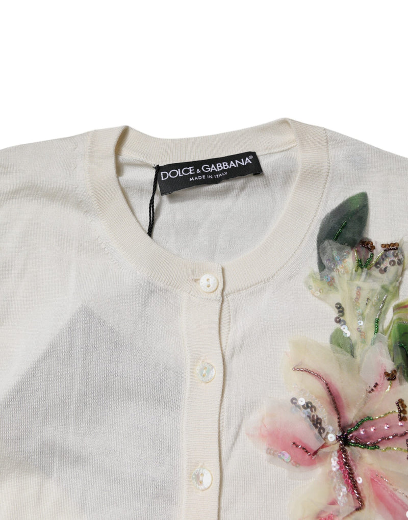 Cárdigan de seda color crema con estampado floral y detalles decorativos de Dolce & Gabbana
