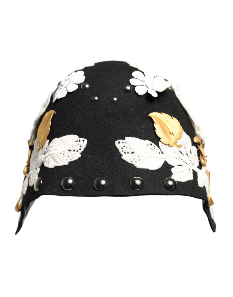 Sombrero cloche de lana negra con flores blancas y hojas doradas de Dolce & Gabbana