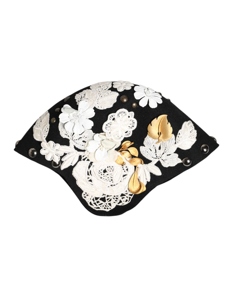 Sombrero cloche de lana negra con flores blancas y hojas doradas de Dolce & Gabbana