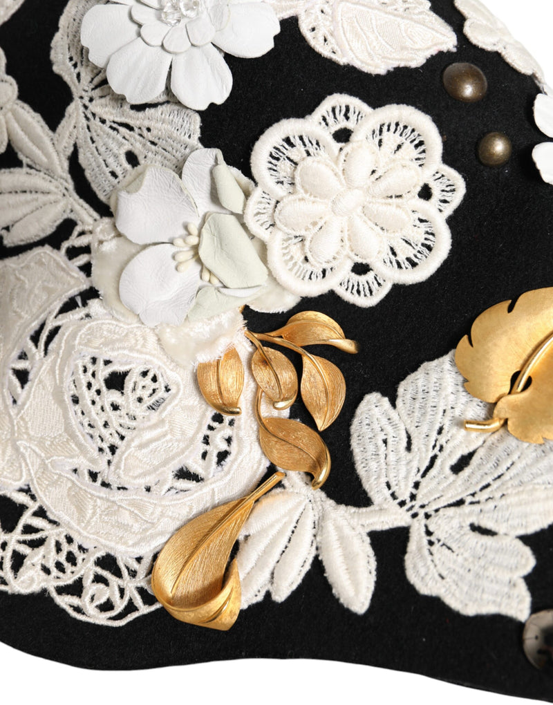 Sombrero cloche de lana negra con flores blancas y hojas doradas de Dolce & Gabbana