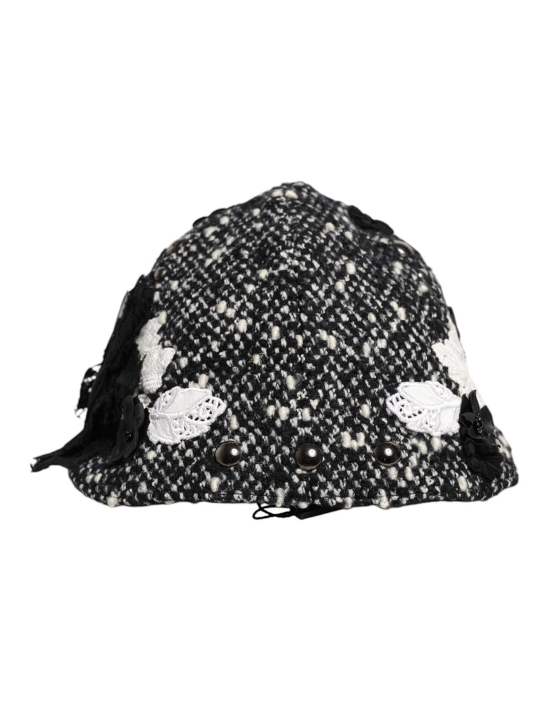 Sombrero cloche de lana negra con flores blancas y adornos de Dolce & Gabbana