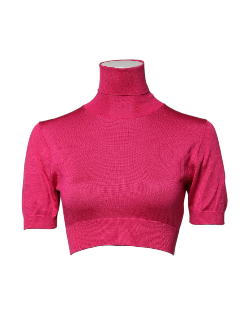 Top corto de punto de seda rosa con cuello alto de Dolce & Gabbana