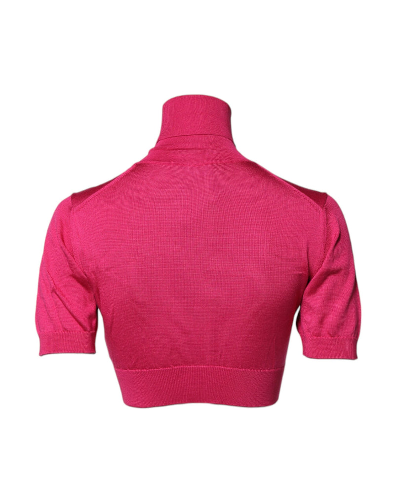 Top corto de punto de seda rosa con cuello alto de Dolce & Gabbana
