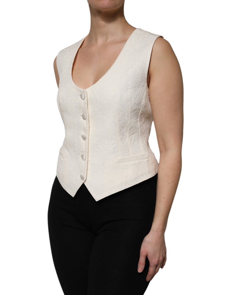 Top tipo chaleco sin mangas de algodón color marfil con botones de Dolce & Gabbana