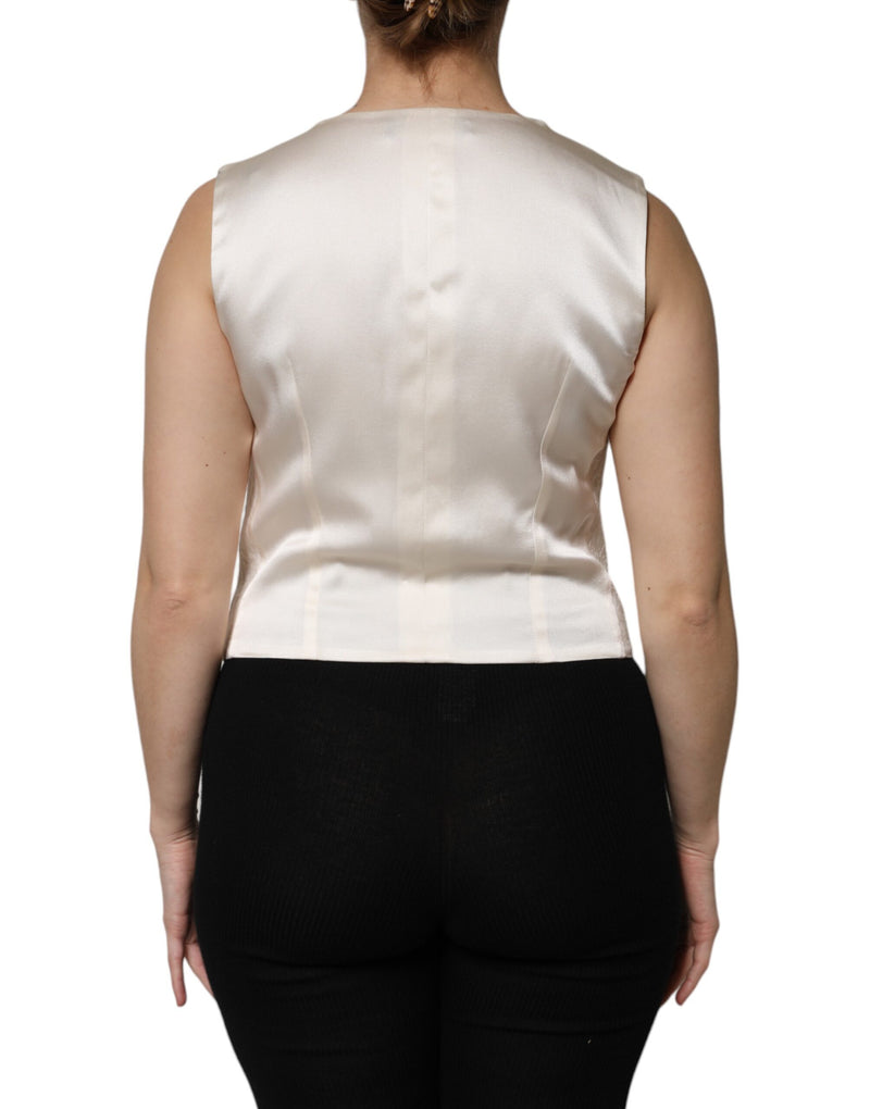 Top tipo chaleco sin mangas de algodón color marfil con botones de Dolce & Gabbana