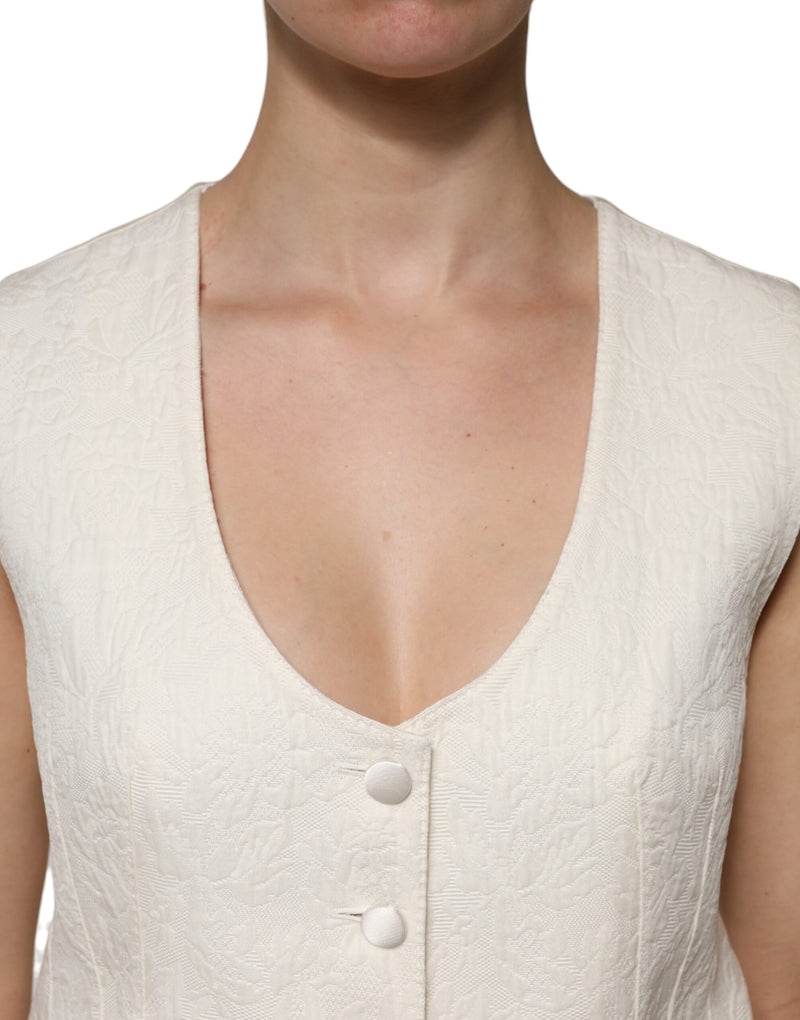 Top tipo chaleco sin mangas de algodón color marfil con botones de Dolce & Gabbana