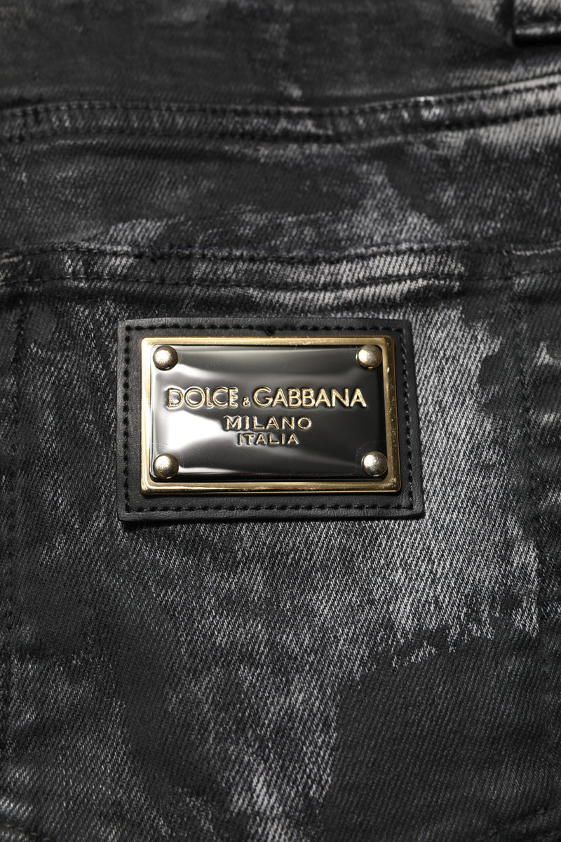 Vaqueros ajustados de mezclilla negra lavada con adornos Dolce & Gabbana