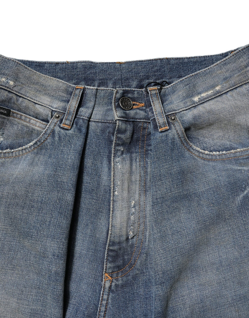 Jeans da uomo in denim blu di cotone effetto strappato Dolce & Gabbana