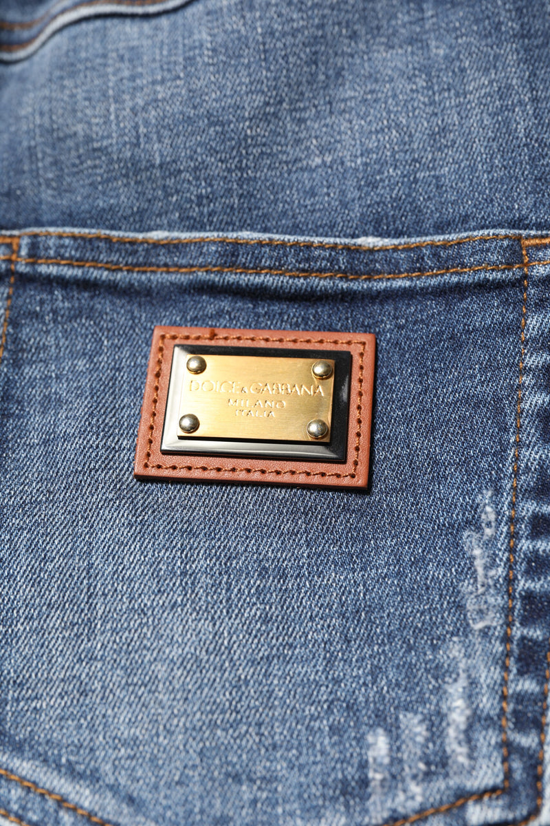 Jeans Dolce & Gabbana em denim azul com aplicação de strass