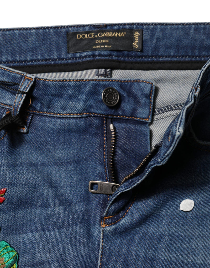 Jeans ajustados de mezclilla azul de algodón de cintura media de Dolce & Gabbana
