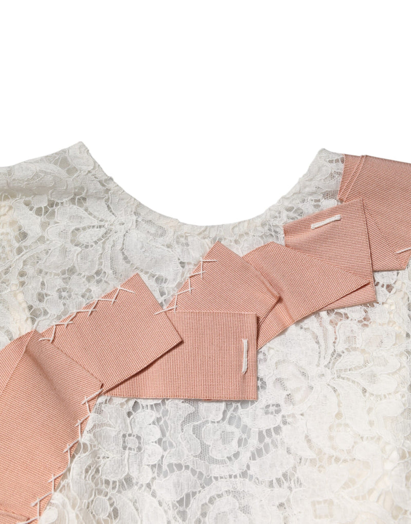 Blusa blanca de manga corta con encaje floral de Dolce & Gabbana