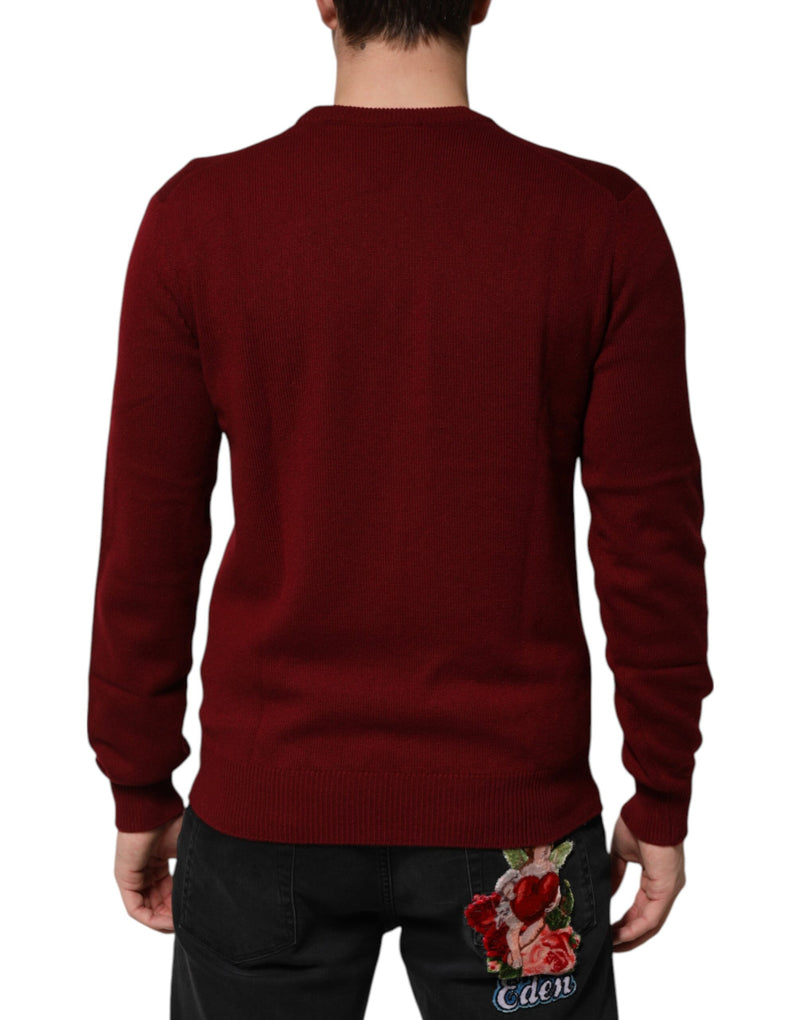 Suéter de cachemira color burdeos de Dolce & Gabbana con emblema de león