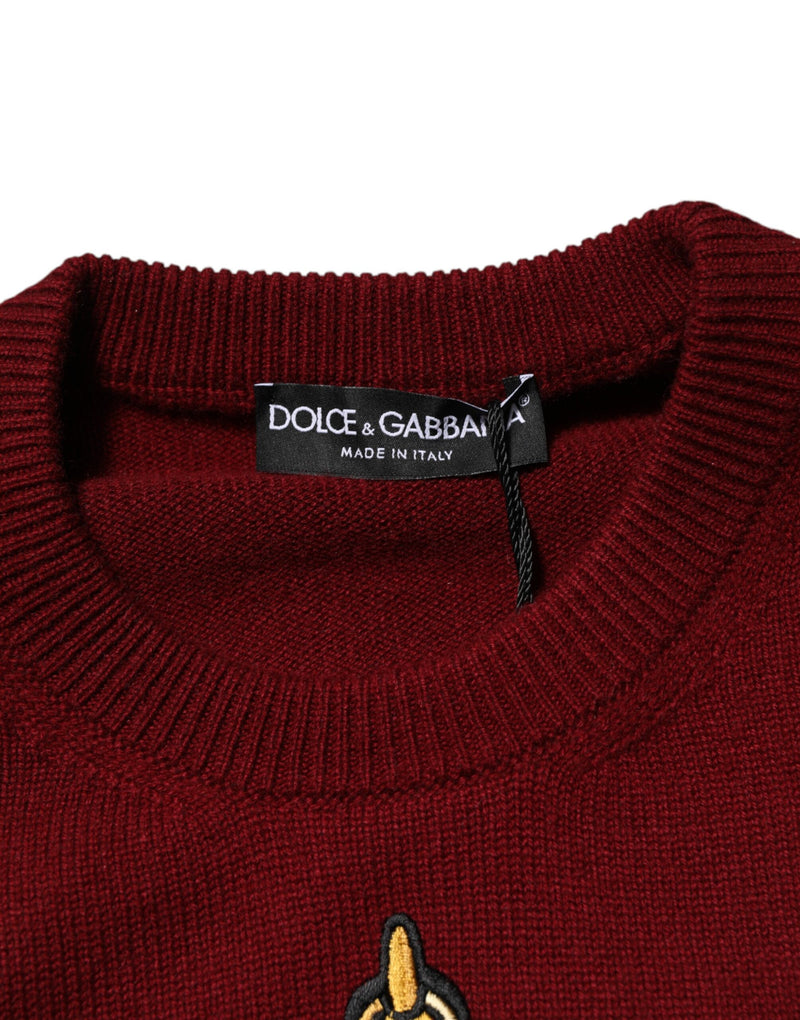 Suéter de cachemira color burdeos de Dolce & Gabbana con emblema de león