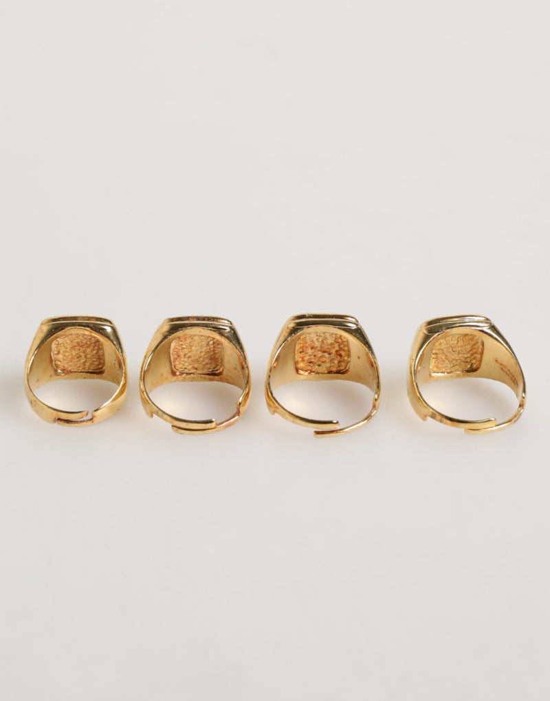 Anillo ajustable con letras JAZZ de latón en tono dorado, juego de 4 piezas Dolce & Gabbana