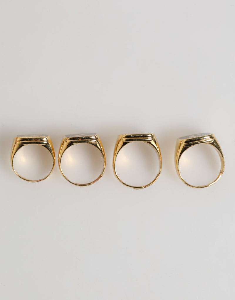 Anillo ajustable con letras JAZZ de latón en tono dorado, juego de 4 piezas Dolce & Gabbana