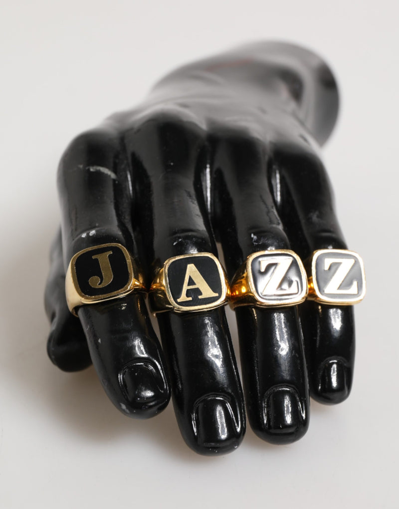 Anillo ajustable con letras JAZZ de latón en tono dorado, juego de 4 piezas Dolce & Gabbana