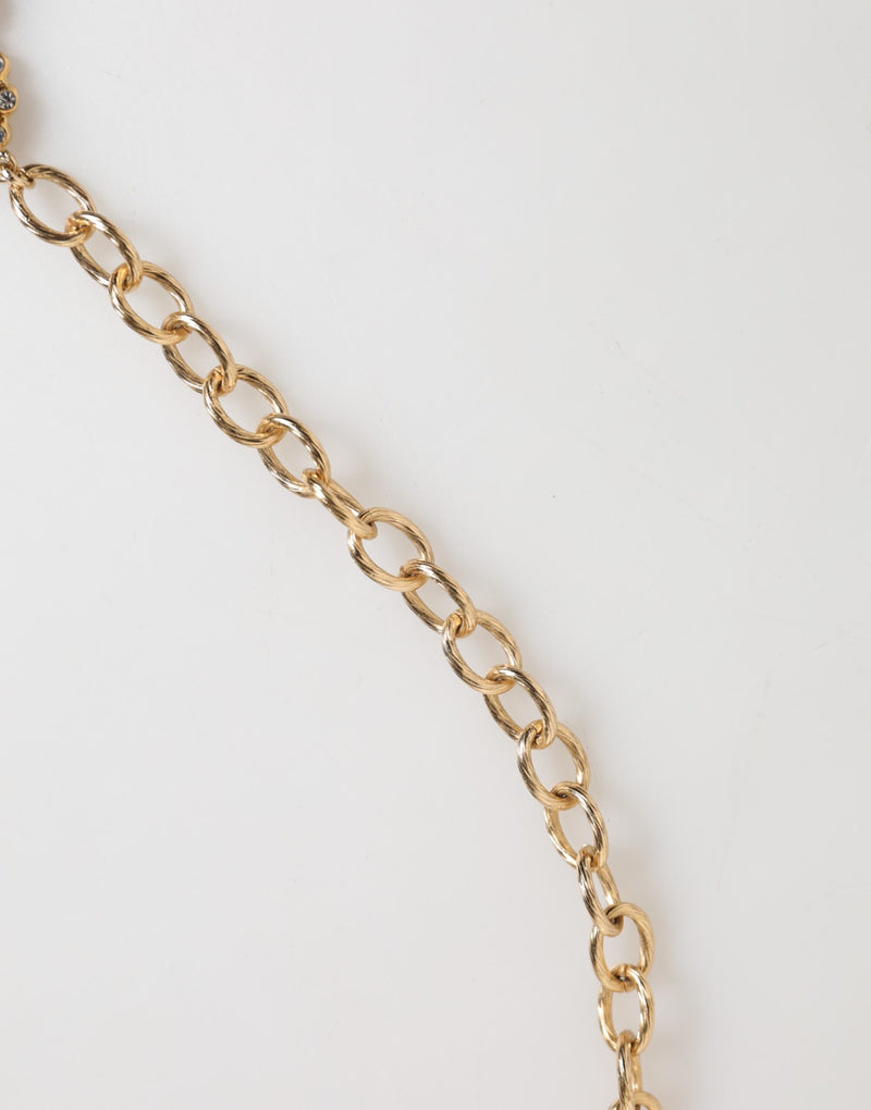 Collar llamativo con colgante de reloj y cristales dorados de Dolce & Gabbana
