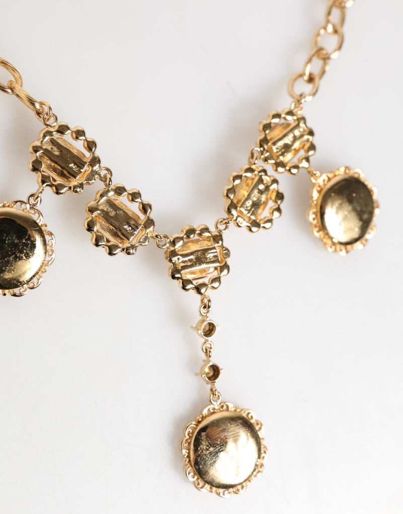 Collar llamativo con colgante de reloj y cristales dorados de Dolce & Gabbana