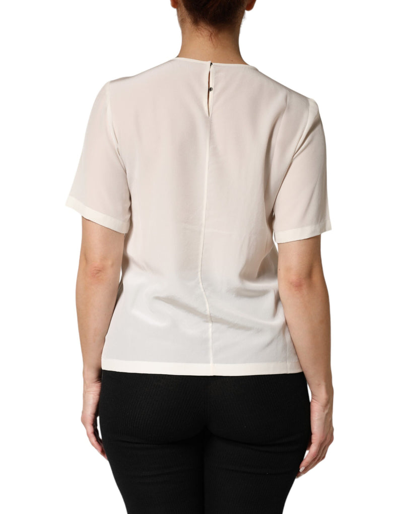 Blusa de seda creme com detalhe em silhueta e mangas curtas da Dolce & Gabbana