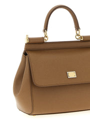 Close-up of the Dolce & Gabbana Sicily Medium Handbag highlights its textured calf leather and distinctive front logo tag, ideal for discerning women. This Dolce & Gabbana Handbag adds a touch of luxury to any outfit. LDin, Spring - Summer 2026, Women, Women > Bags, Women > Bags > Handbag, Yes Eu.