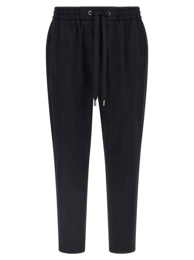 Dolce & Gabbana Logo Plaque Pants | URBALENTI™ NYC