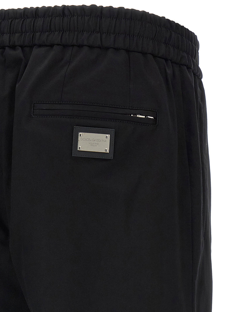 Dolce & Gabbana Logo Plaque Pants | URBALENTI™ NYC