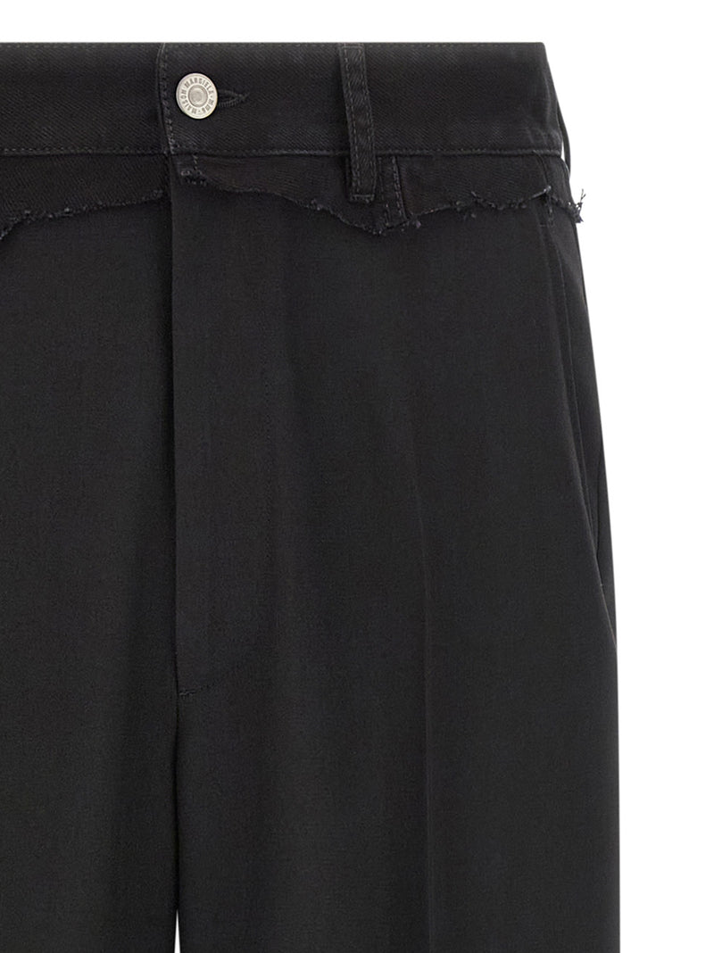 Pantalones MM6 Maison Margiela con inserto de denim