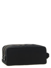 Side view of the Tom Ford Skin Details Beauty bag showcasing its minimalist design and double top zip closure, ideal for men’s accessories. This lifestyle essential, recognized for Fall - Winter 2025/2026, epitomizes elegance and practicality from Tom Ford.