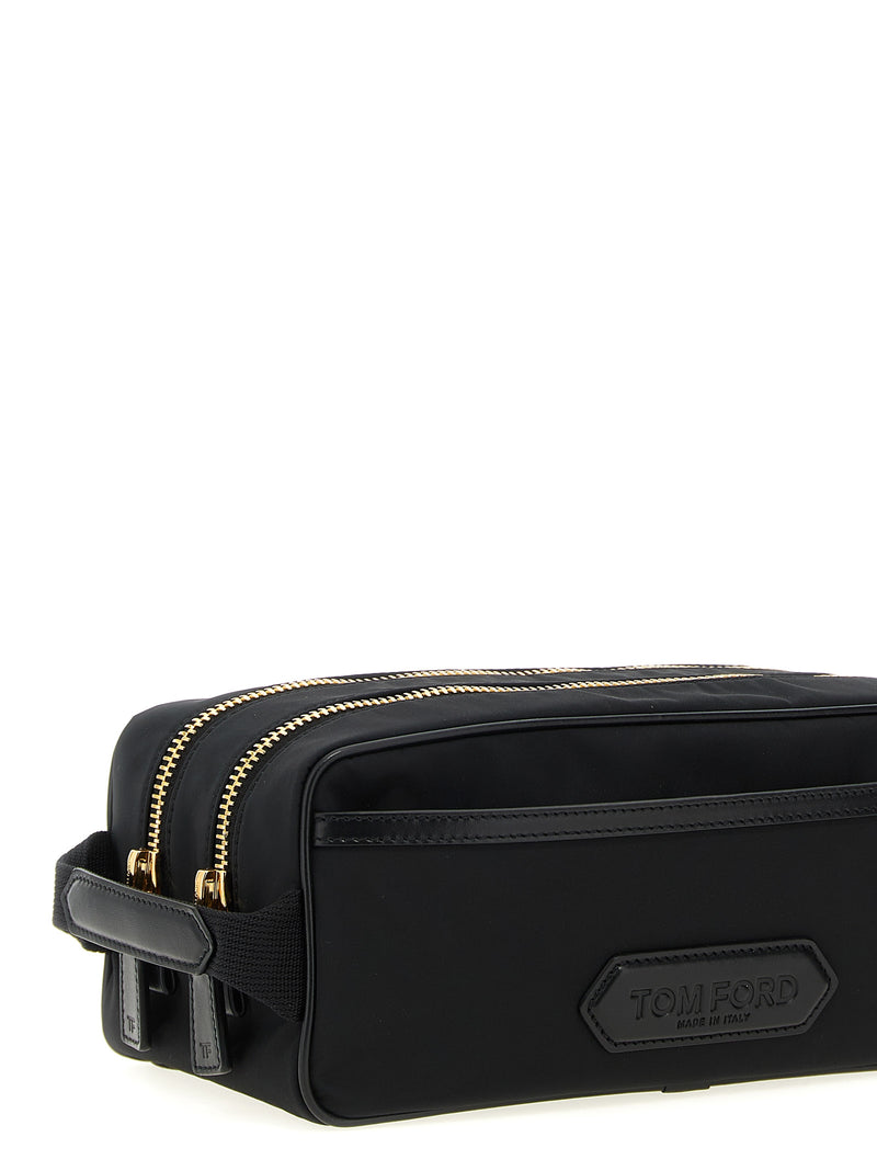 Tom Ford Skin Details Beauty bag with dual zippers and logo patch, providing a functional yet chic solution for men’s lifestyle needs. This accessory is set for Fall - Winter 2025/2026, making it a must-have for any modern man looking for stylish utility.