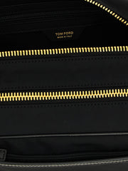 Interior view of the Tom Ford Skin Details Beauty bag highlights its organized compartments, perfect for the contemporary man. This accessory encapsulates Tom Ford's luxury and is ideal for Fall - Winter 2025/2026, designed for those who appreciate fine men’s accessories.