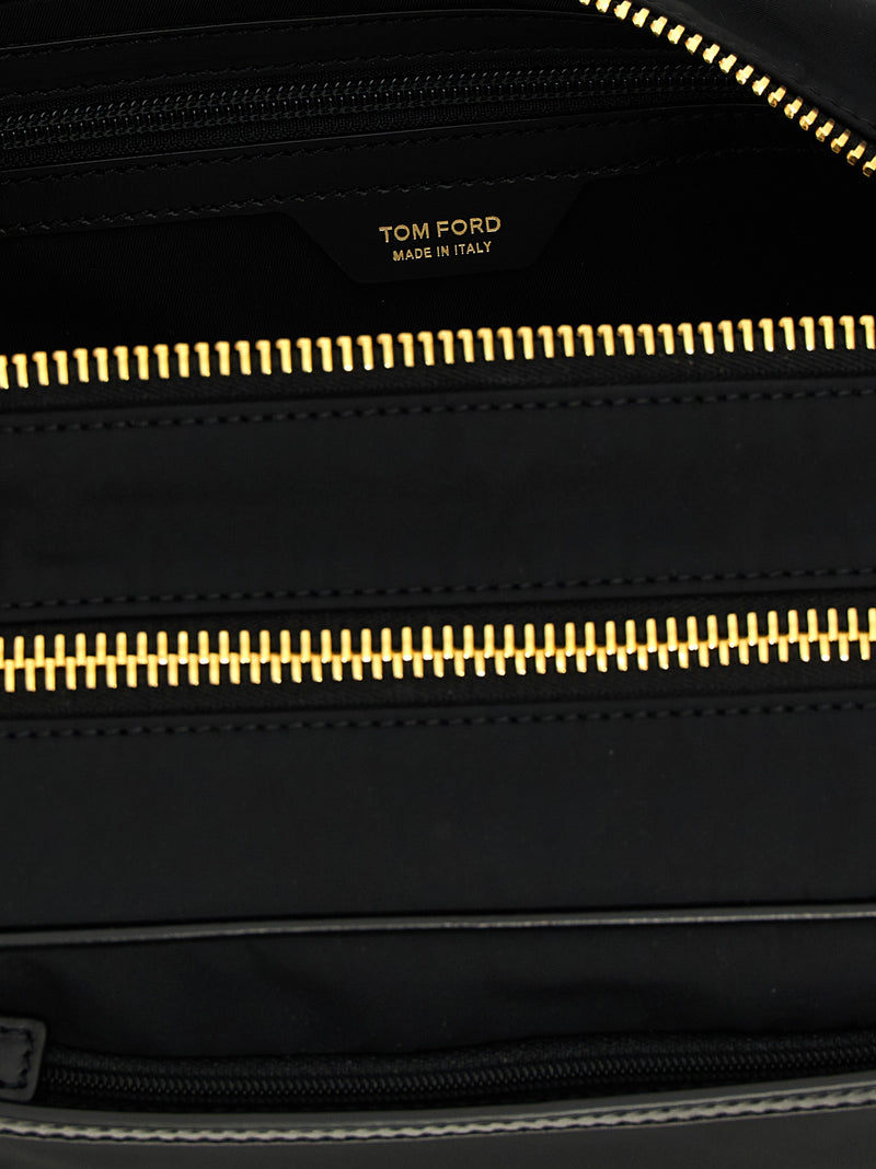 Interior view of the Tom Ford Skin Details Beauty bag highlights its organized compartments, perfect for the contemporary man. This accessory encapsulates Tom Ford's luxury and is ideal for Fall - Winter 2025/2026, designed for those who appreciate fine men’s accessories.