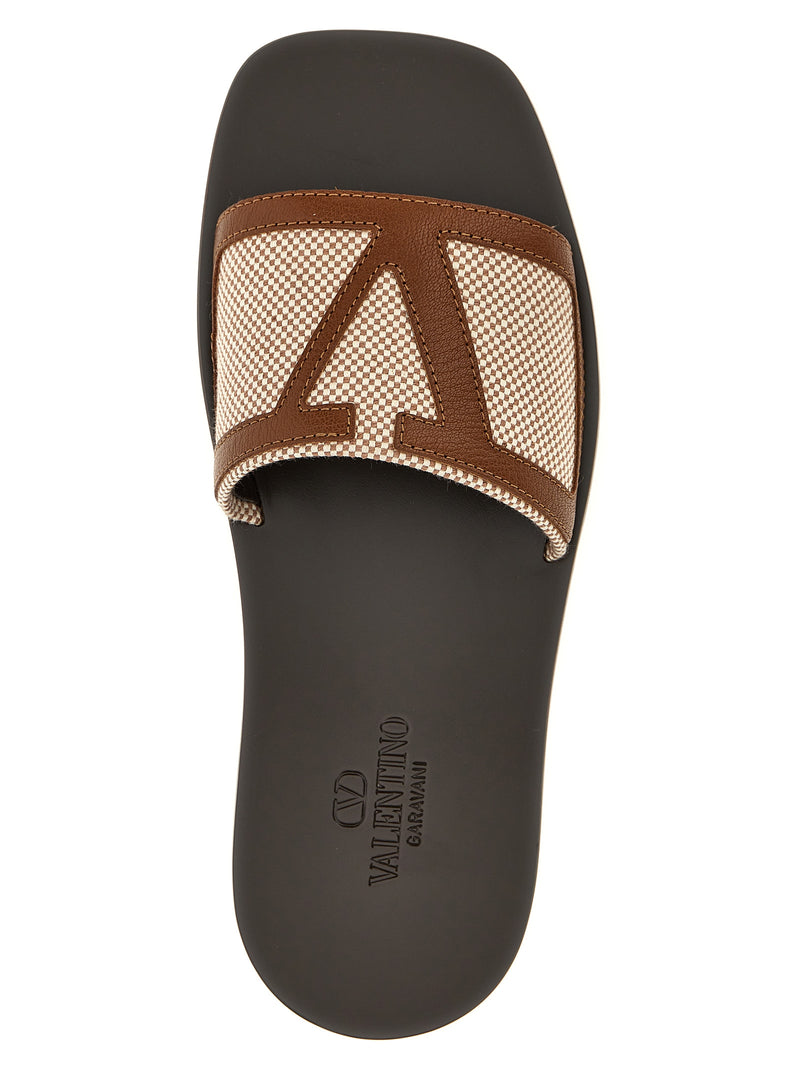 Valentino Garavani Vlogo Signature Slides | Urbalenti... | Urbalenti™ NYC
